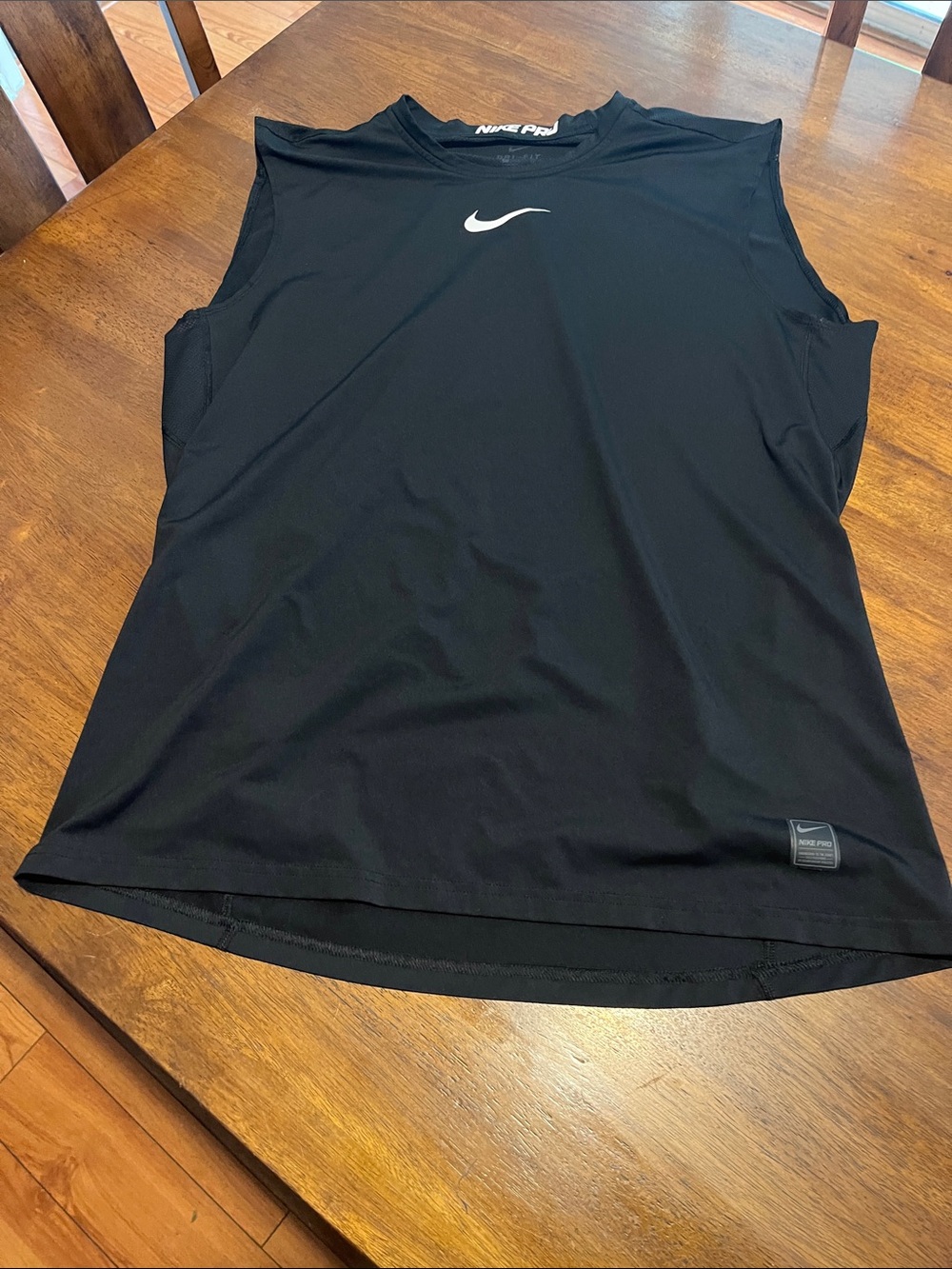 Nike Black Sleeveless Training Tank with White Swoosh